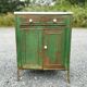 Patinated metal furniture