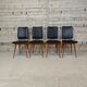 Set of 4 vintage chairs with tapered legs.