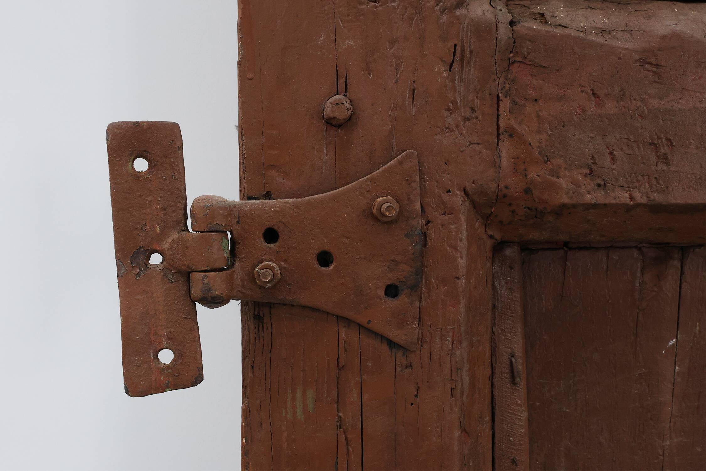Large 17th century Monastery doors in terracotta lacquered oak, Portugal