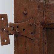 Large 17th century Monastery doors in terracotta lacquered oak, Portugal