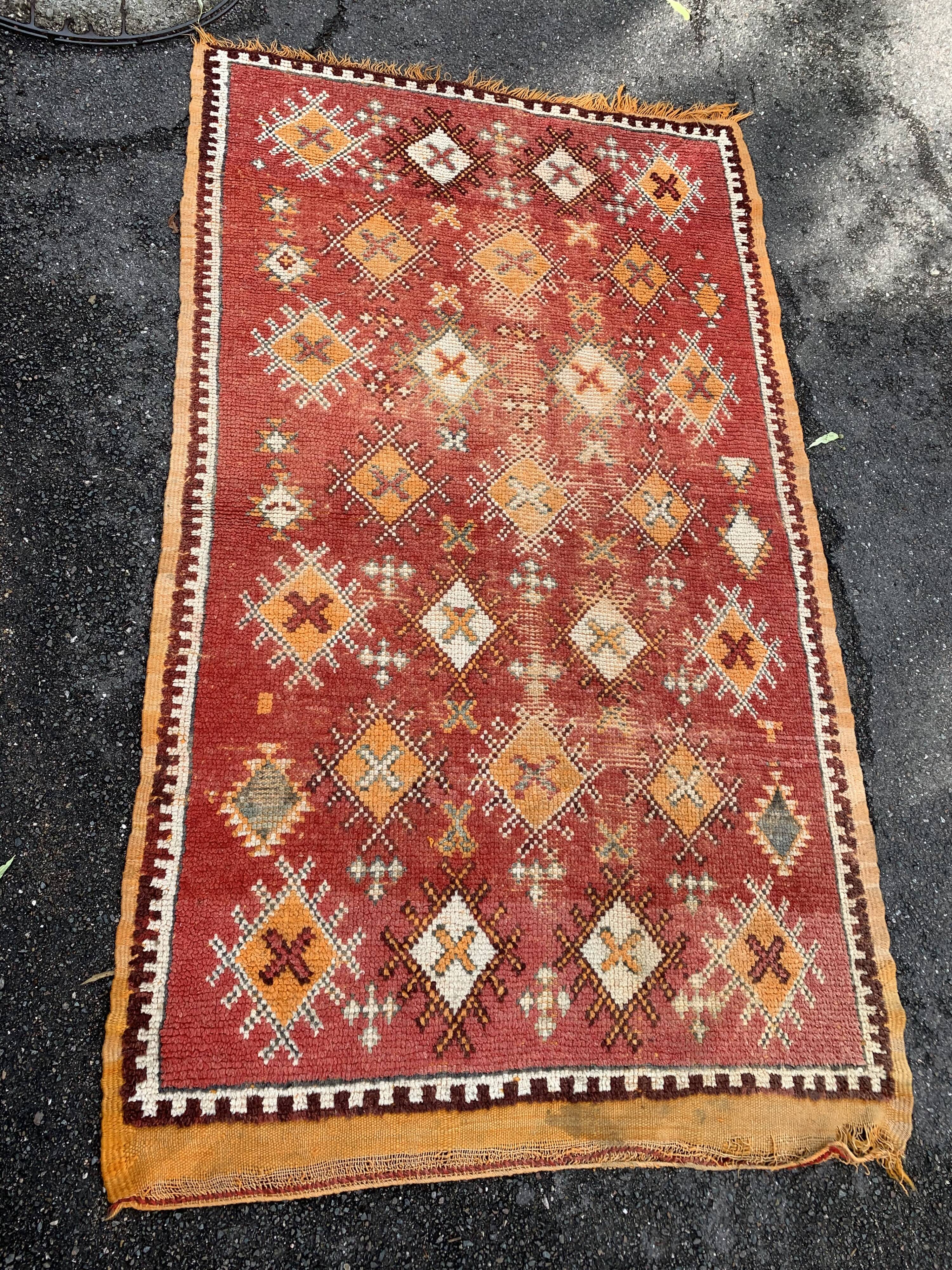 Old orange kilim carpet