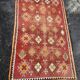 Old orange kilim carpet