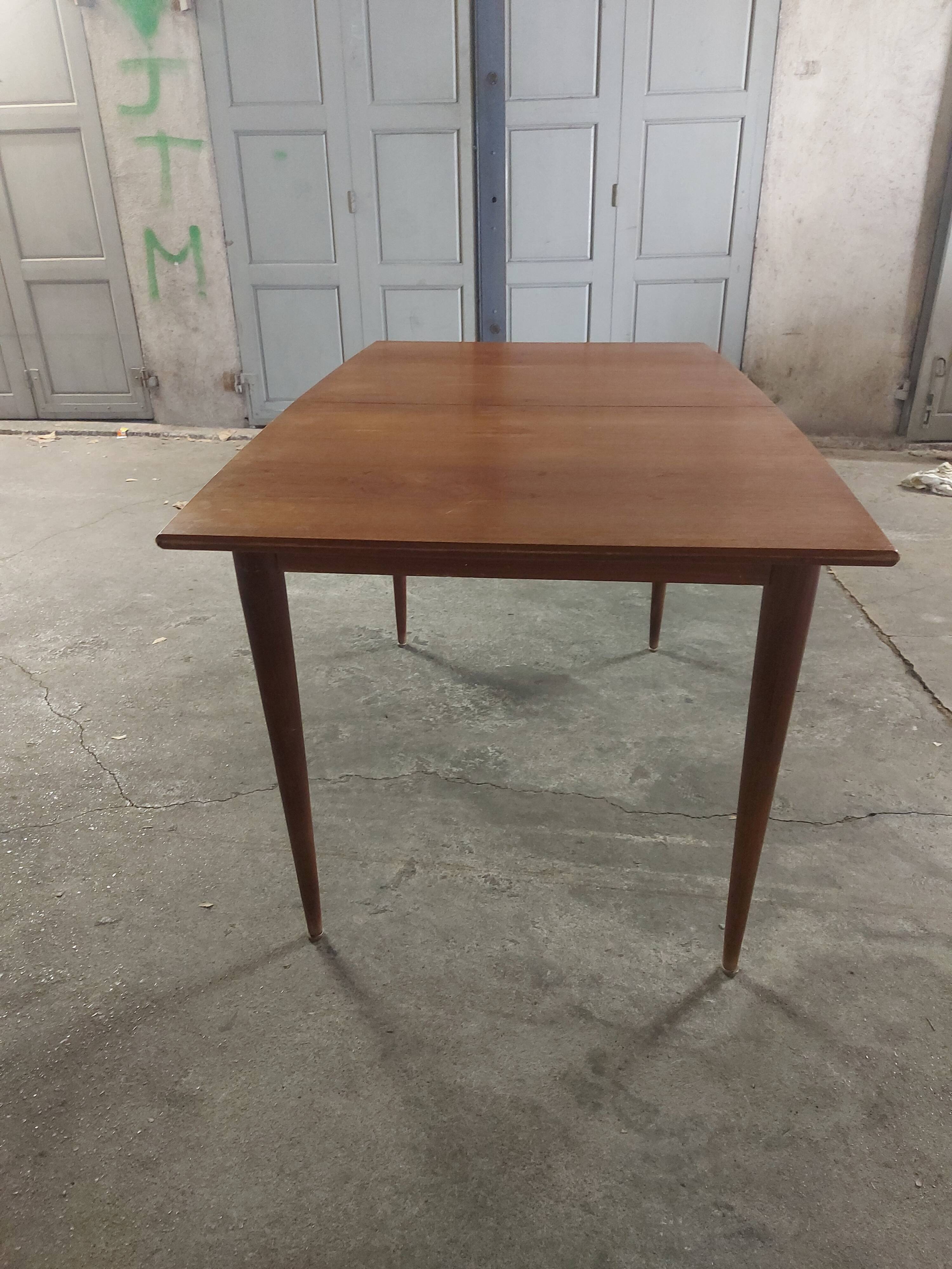 Scandinavian teak table with built-in extension