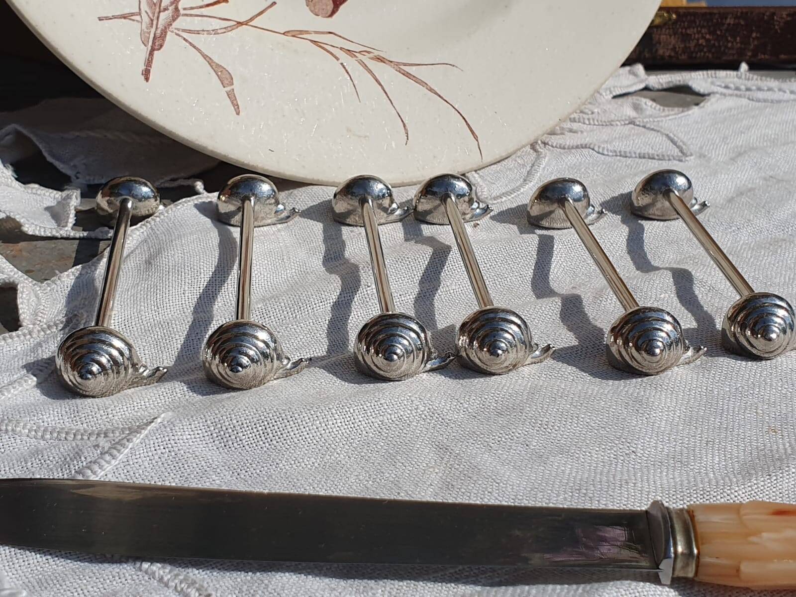 expensive silver metal snail door