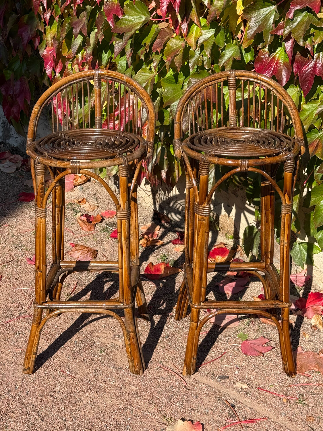 Pair of 1960s rattan stools from France.