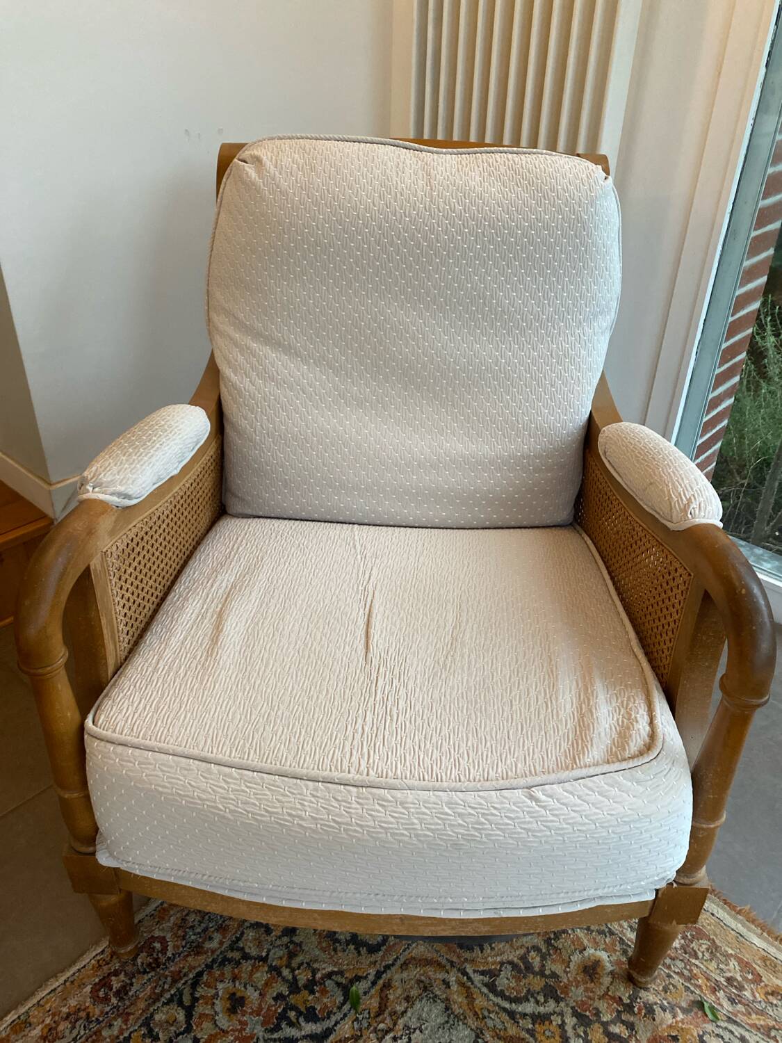 Sofa and armchair in cane and wood by Jean Roche