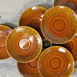 Set of 8 cups accompanied by their saucers