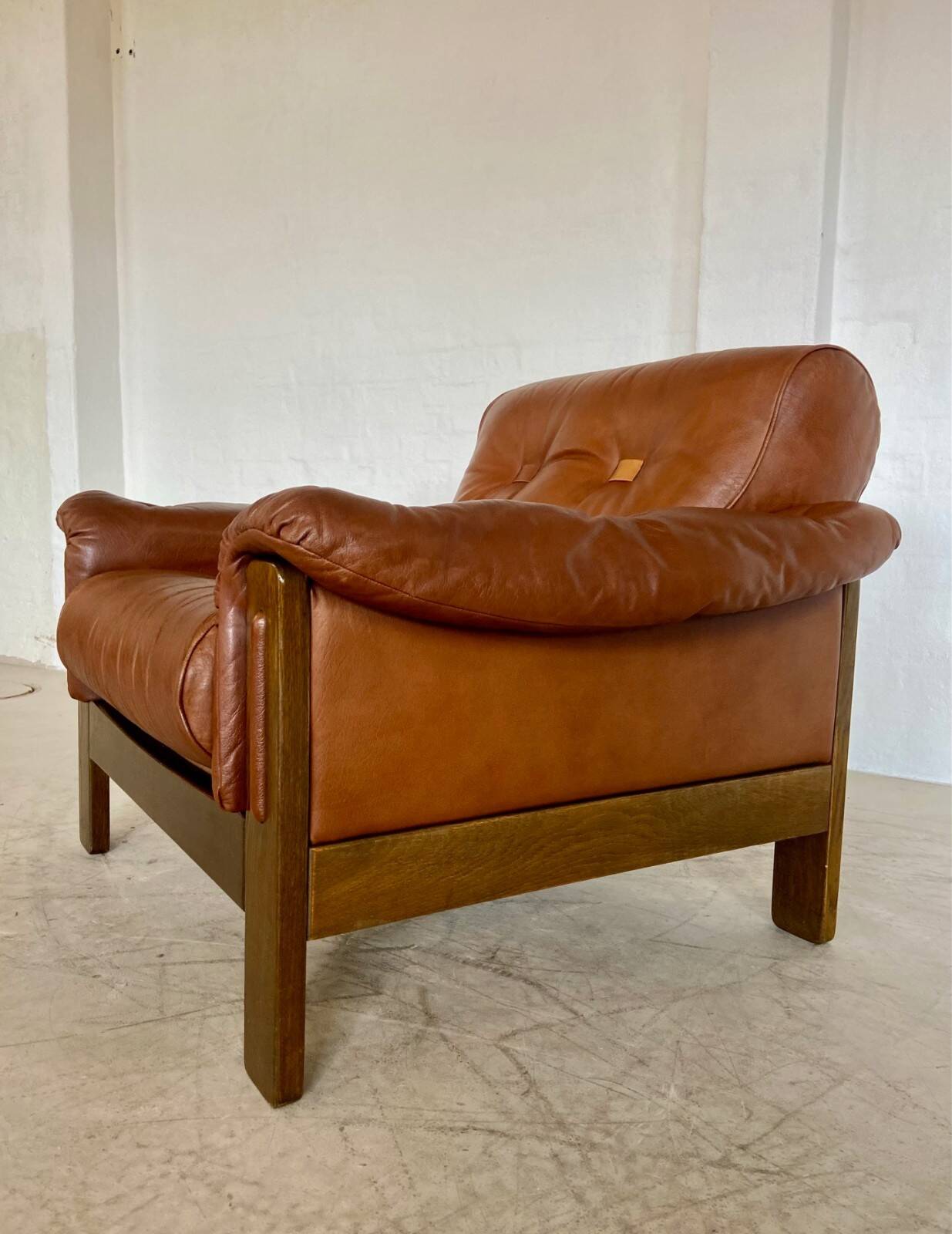Mid-century vintage Scandinavian leather lounge chair in cognac brown leather
