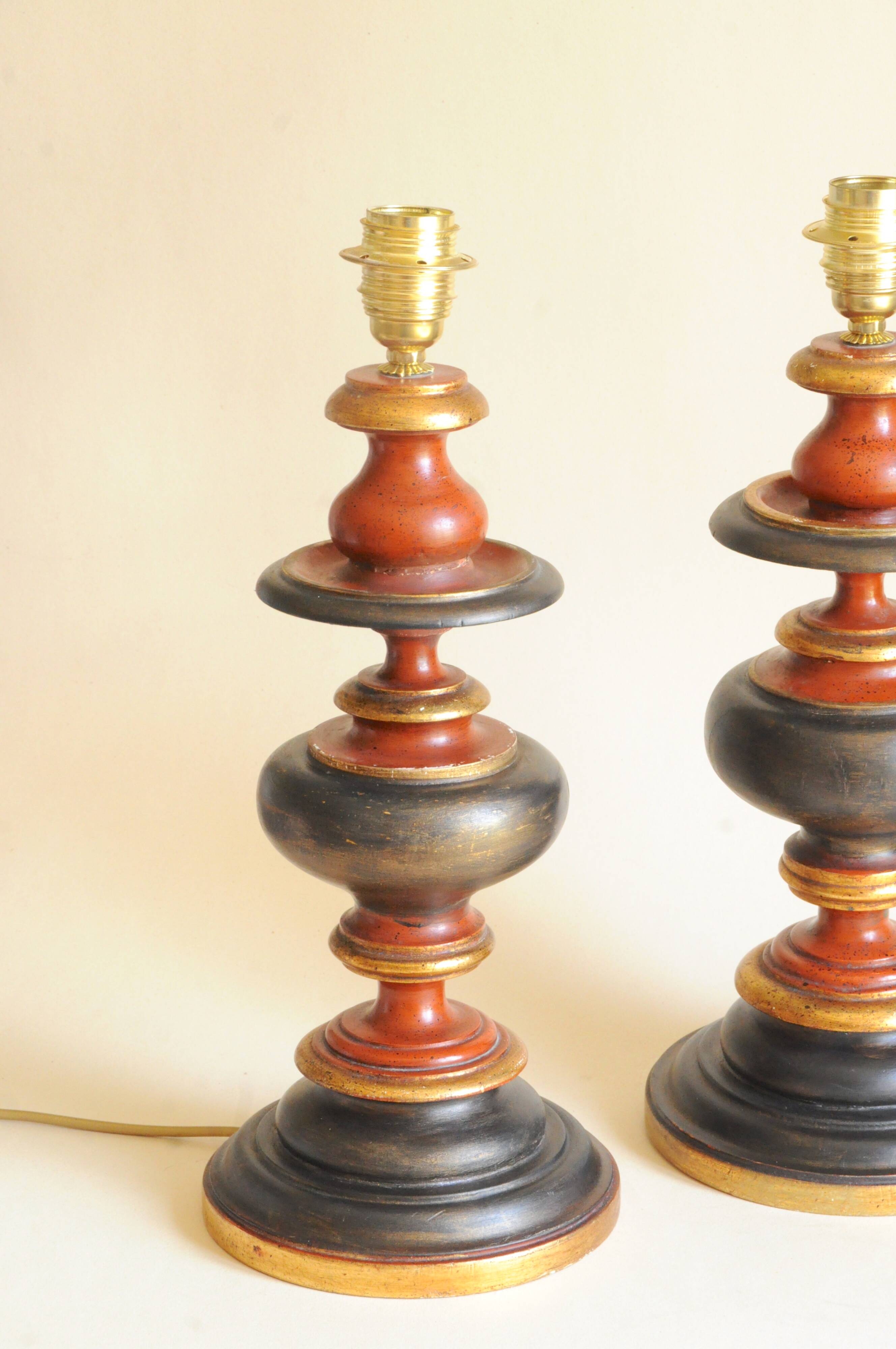 Pair of polychrome wooden baluster lamp bases - red, black and gold