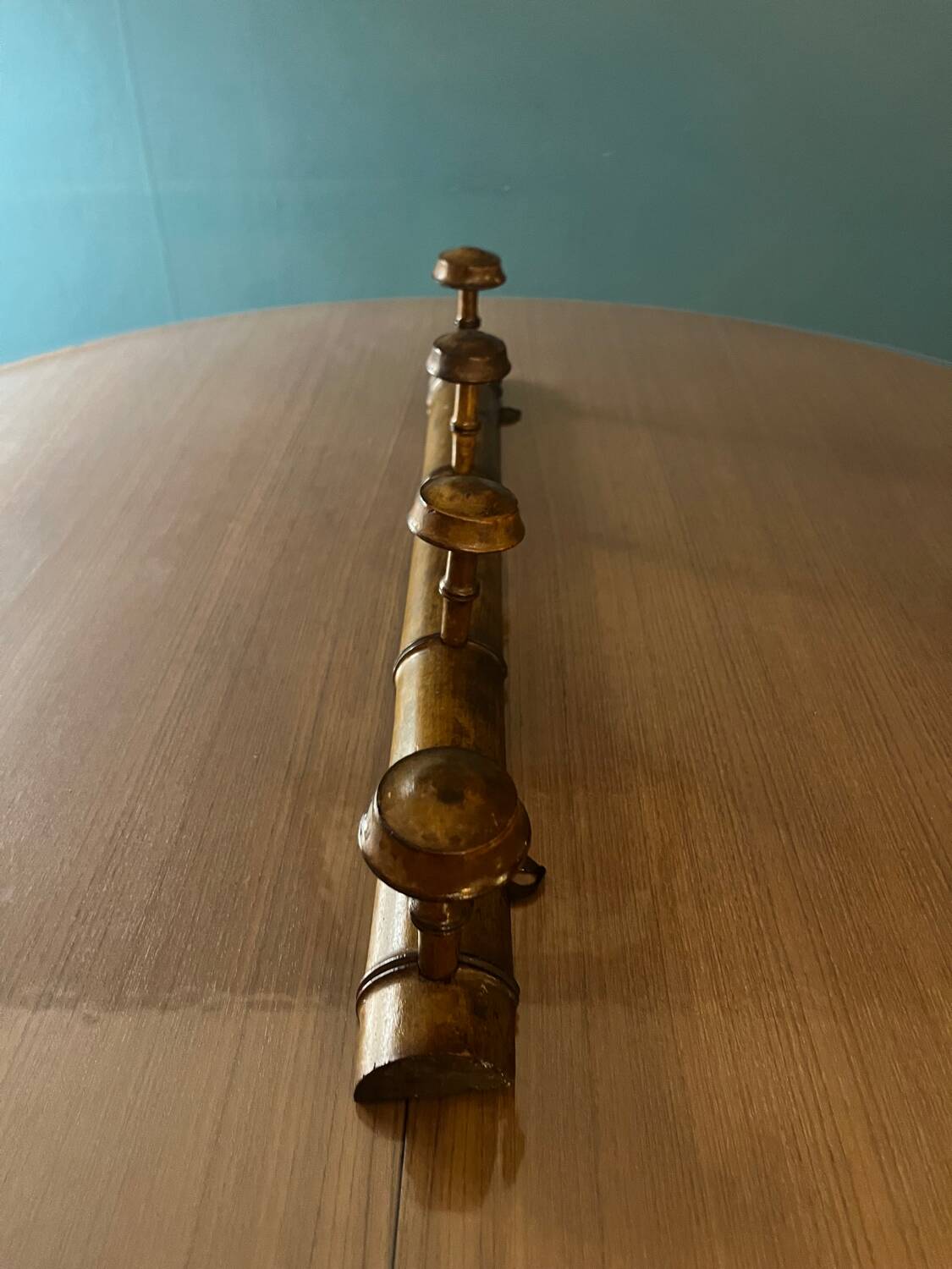 Old wooden wall coat rack