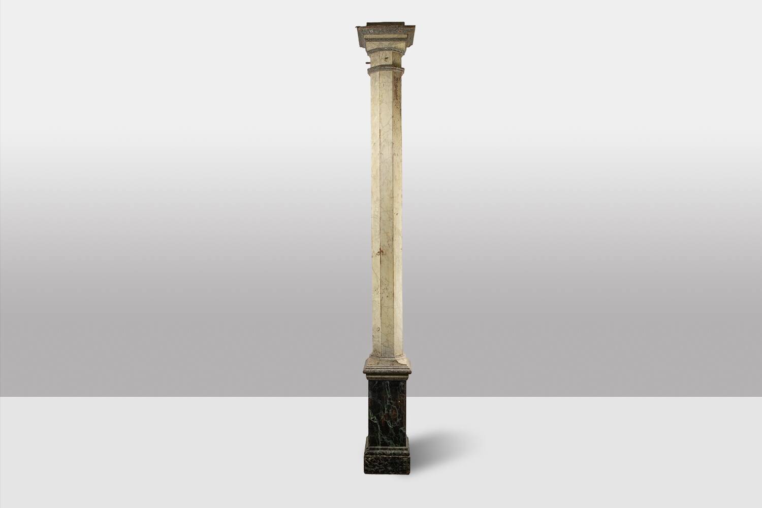 Pair of wooden columns painted to imitate marble. 1880s.