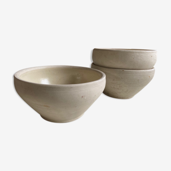 Trio of enamelled sandstone bowls