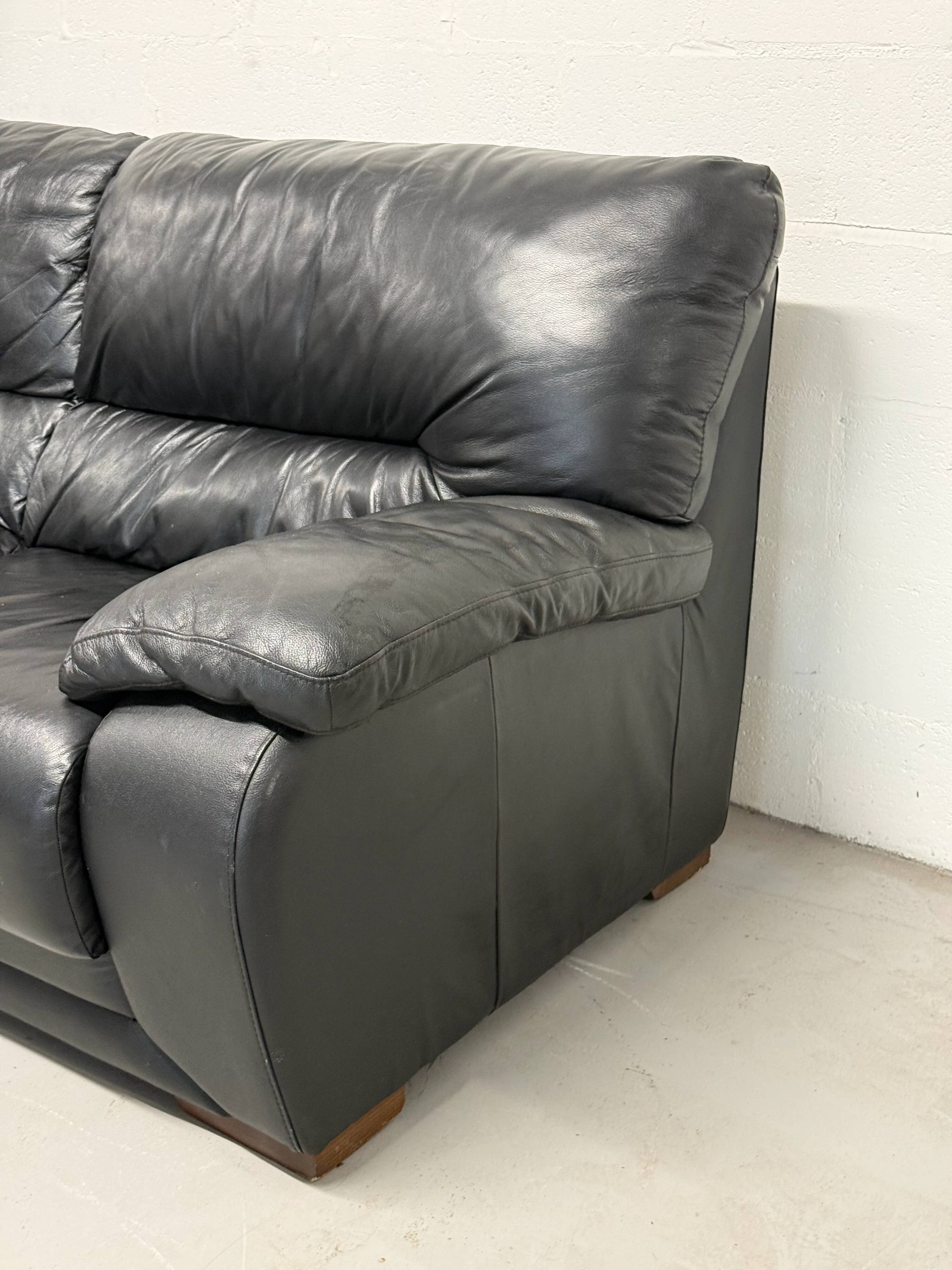 Black leather sofa — Italian postmodern design