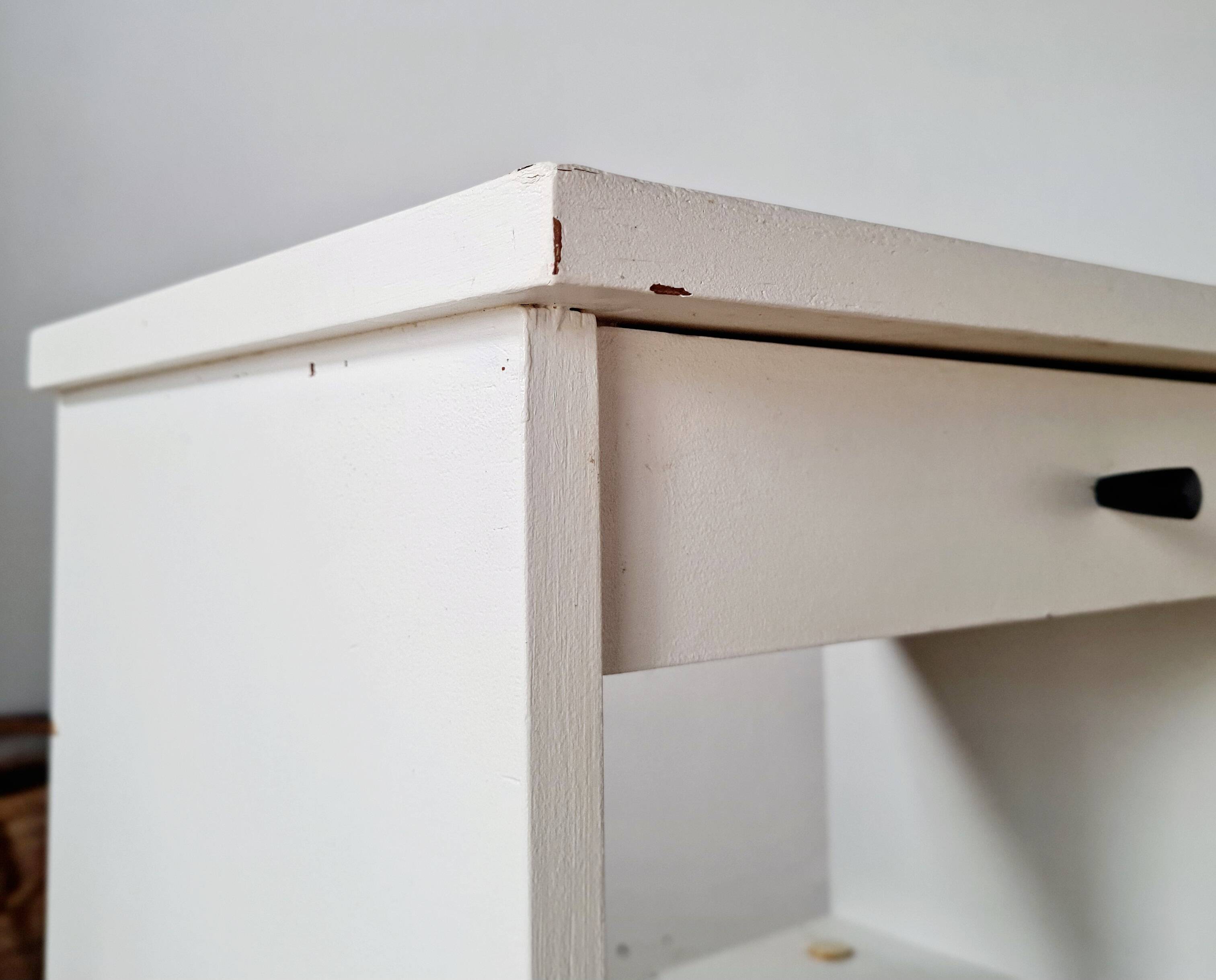 Vintage bedside table with tapered legs - white
