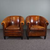 Set of 2 club chairs in black piping sheep leather