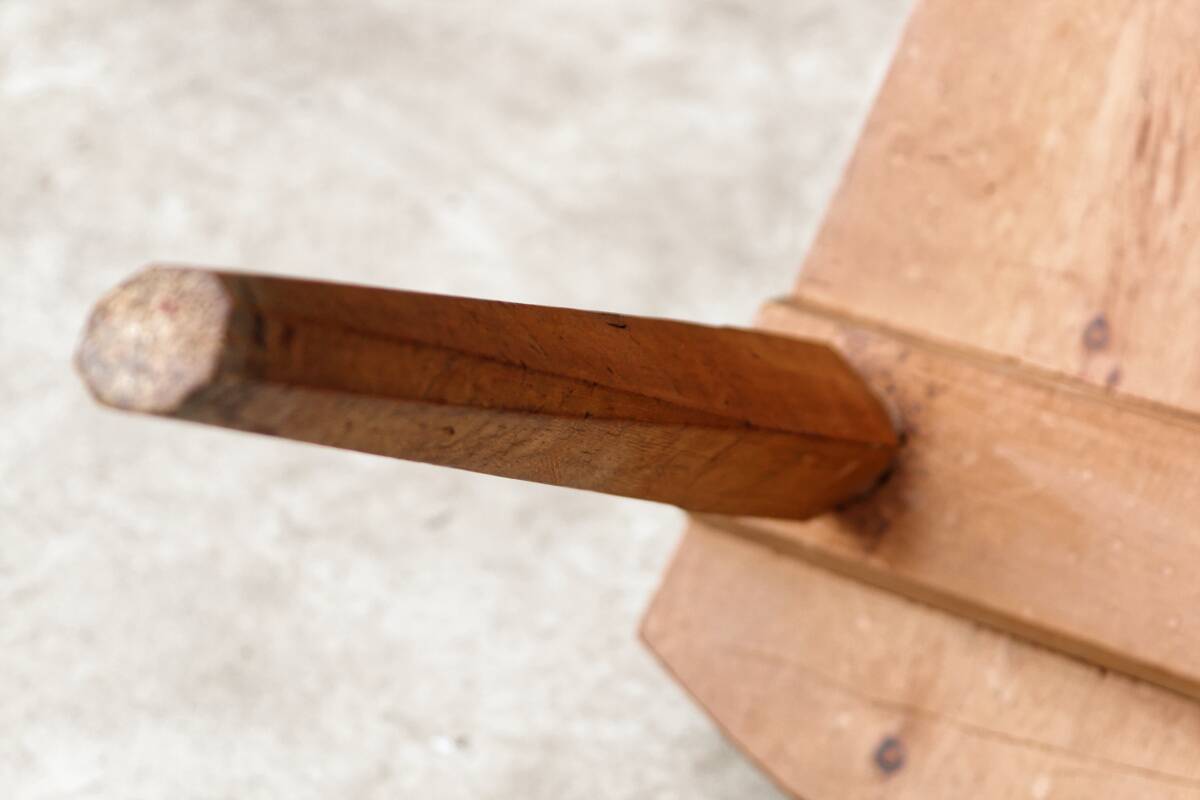 Old Swiss escabelle chair in carved wood