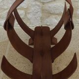 Unique piece of a magazine rack or log rack in solid oak pegged with leather handle