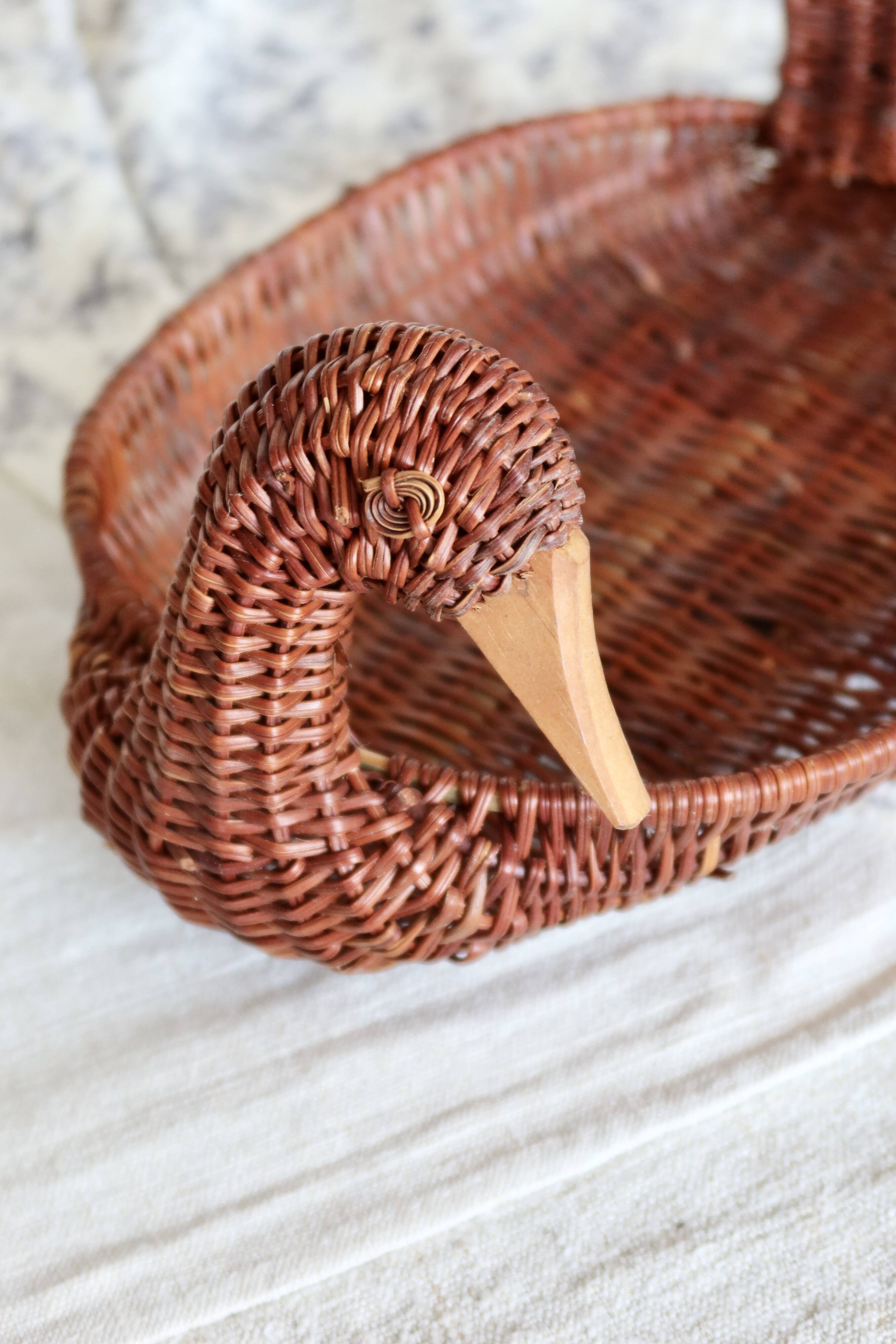 Vintage dark wicker duck basket