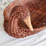 Vintage dark wicker duck basket