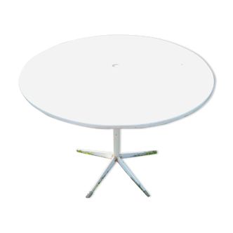 Outdoor table in iron base star of the old foldable bistro