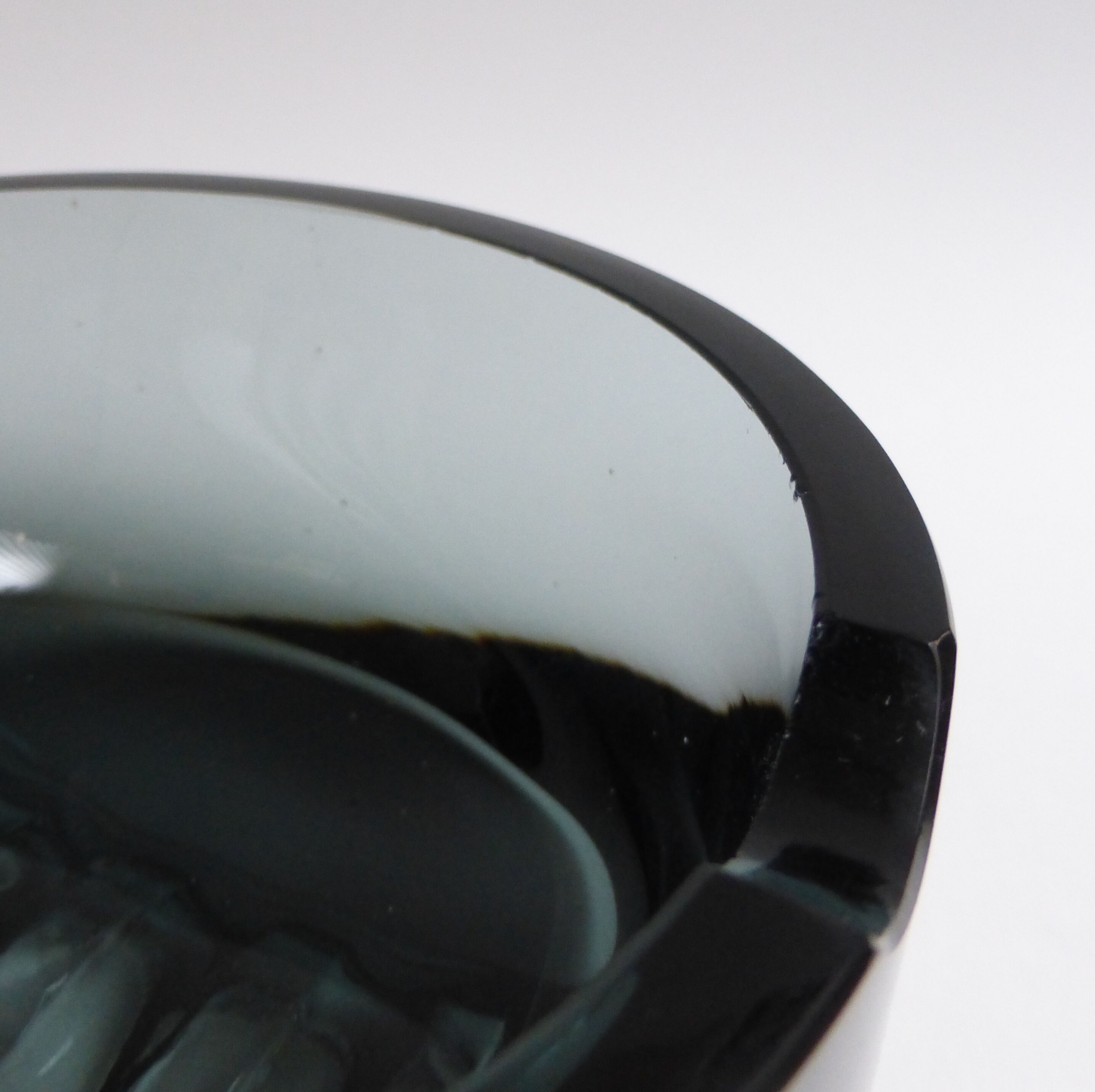 Scandinavian ashtray in 1970's moulded smoked glass