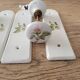 Set of 2 Porcelain door handles and cleanliness plates