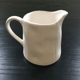 White pitcher streaked in relief