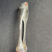Pince à sucre en métal argenté Christofle modèle Vendôme/Arcantia avant 1983