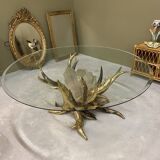 Round glass and brass table by designers Richard and Isabelle Faure