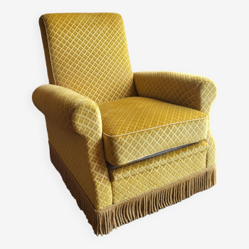 Mustard velvet fringed armchair