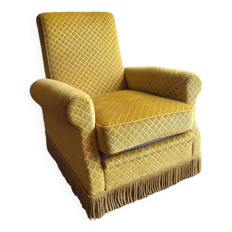 Mustard velvet fringed armchair