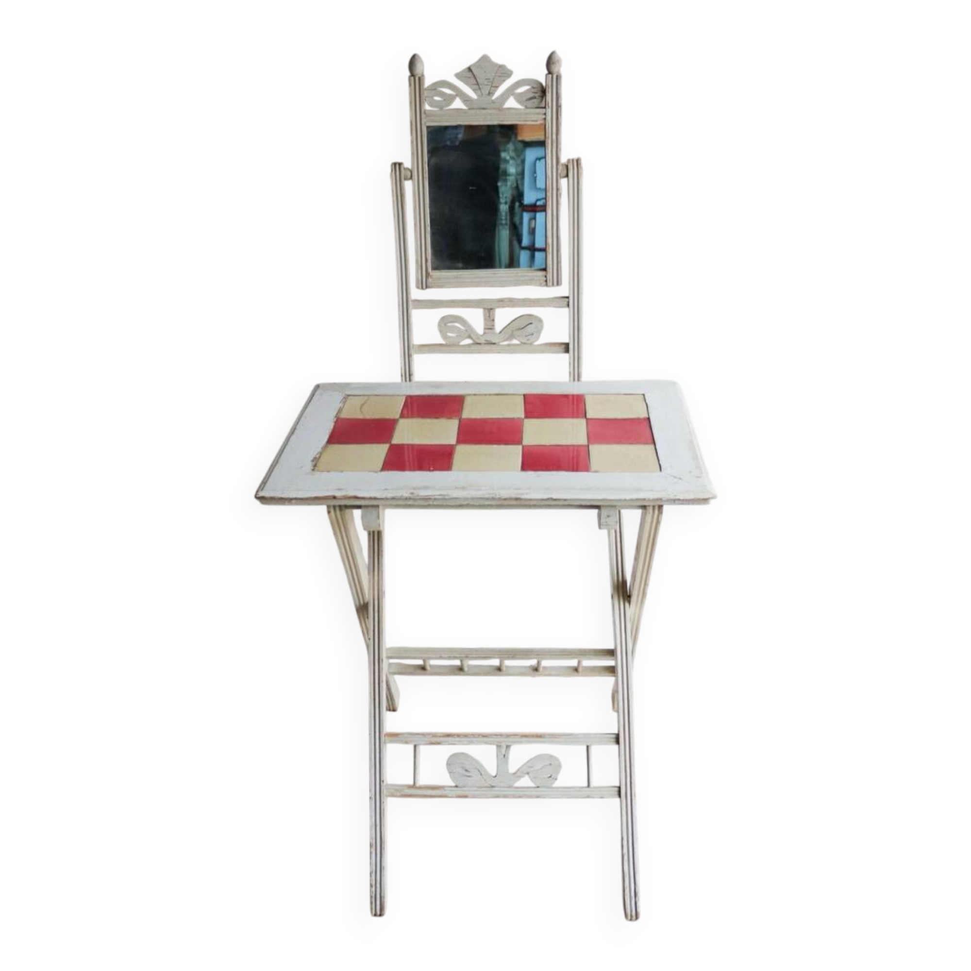 Small antique folding wooden dressing table with tiles and a mercury mirror.