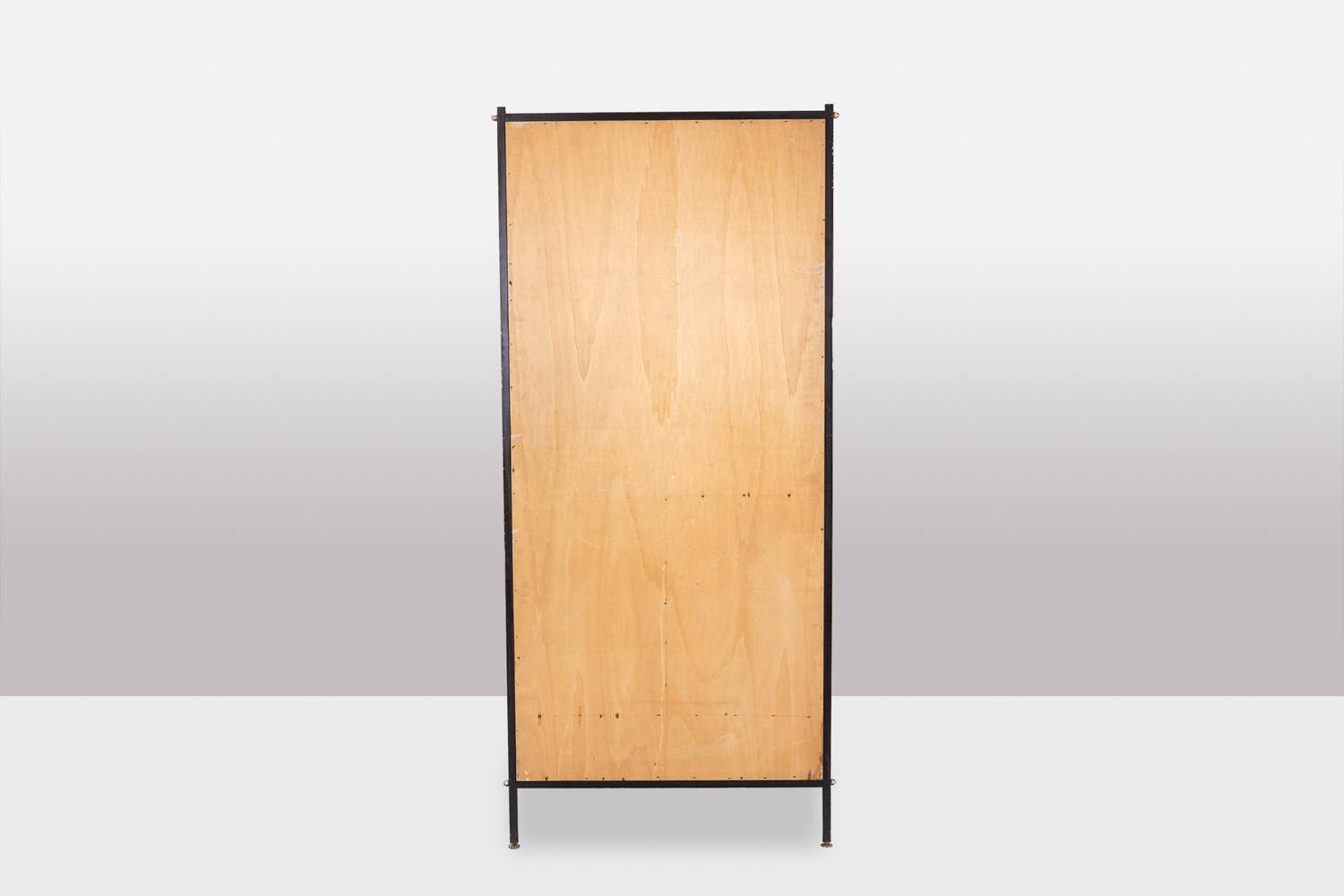 Pair of mahogany veneer and black lacquered iron cabinets. 1950s.