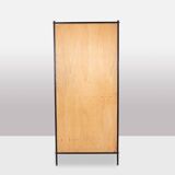 Pair of mahogany veneer and black lacquered iron cabinets. 1950s.