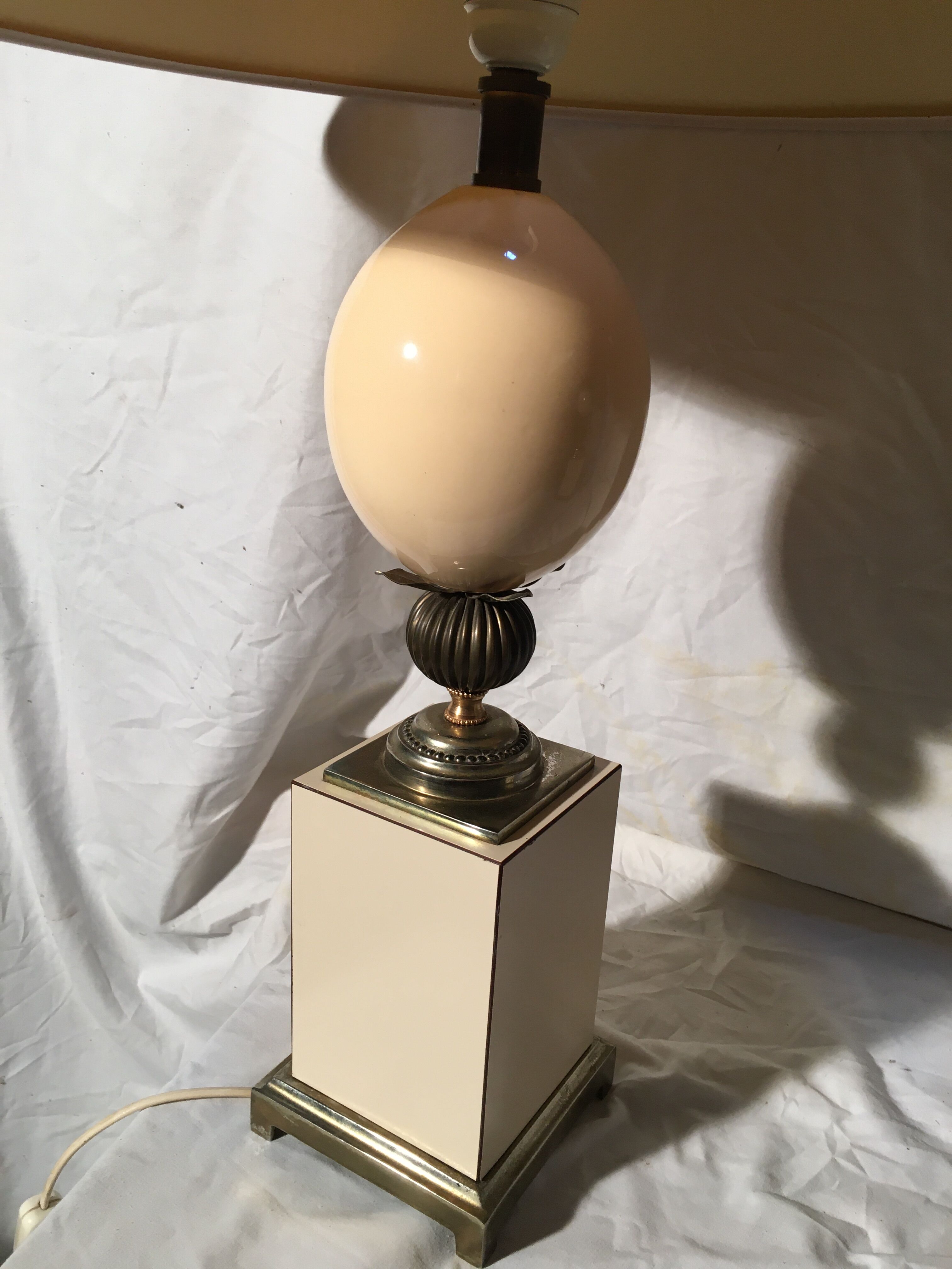 Pair of Hollywood Regency style egg lamps