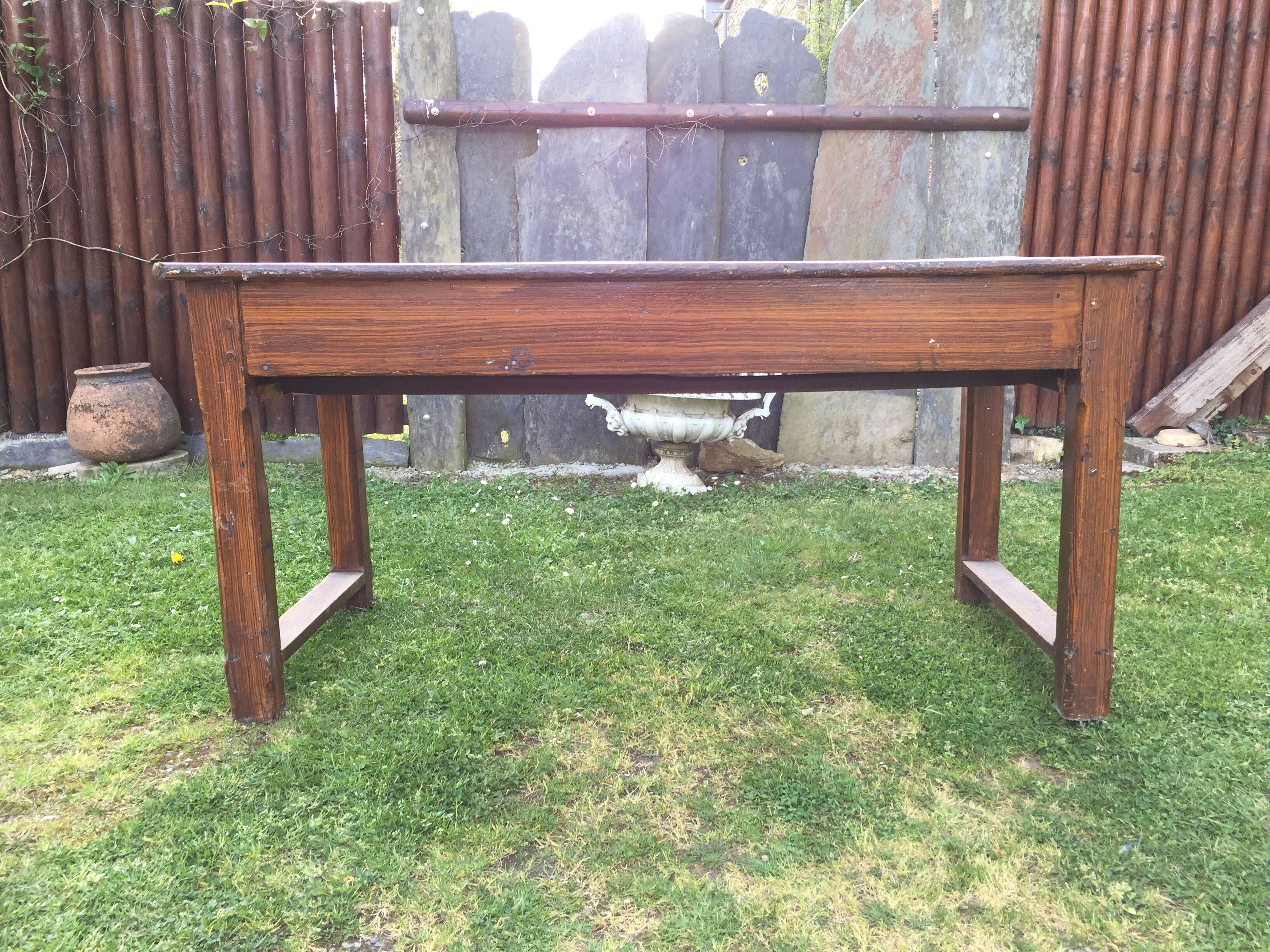 Old farmhouse table in oak painted faux wood old painting.