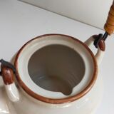 Flowered stoneware teapot with vintage rattan handle