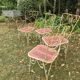 Perforated metal garden chairs and armchairs