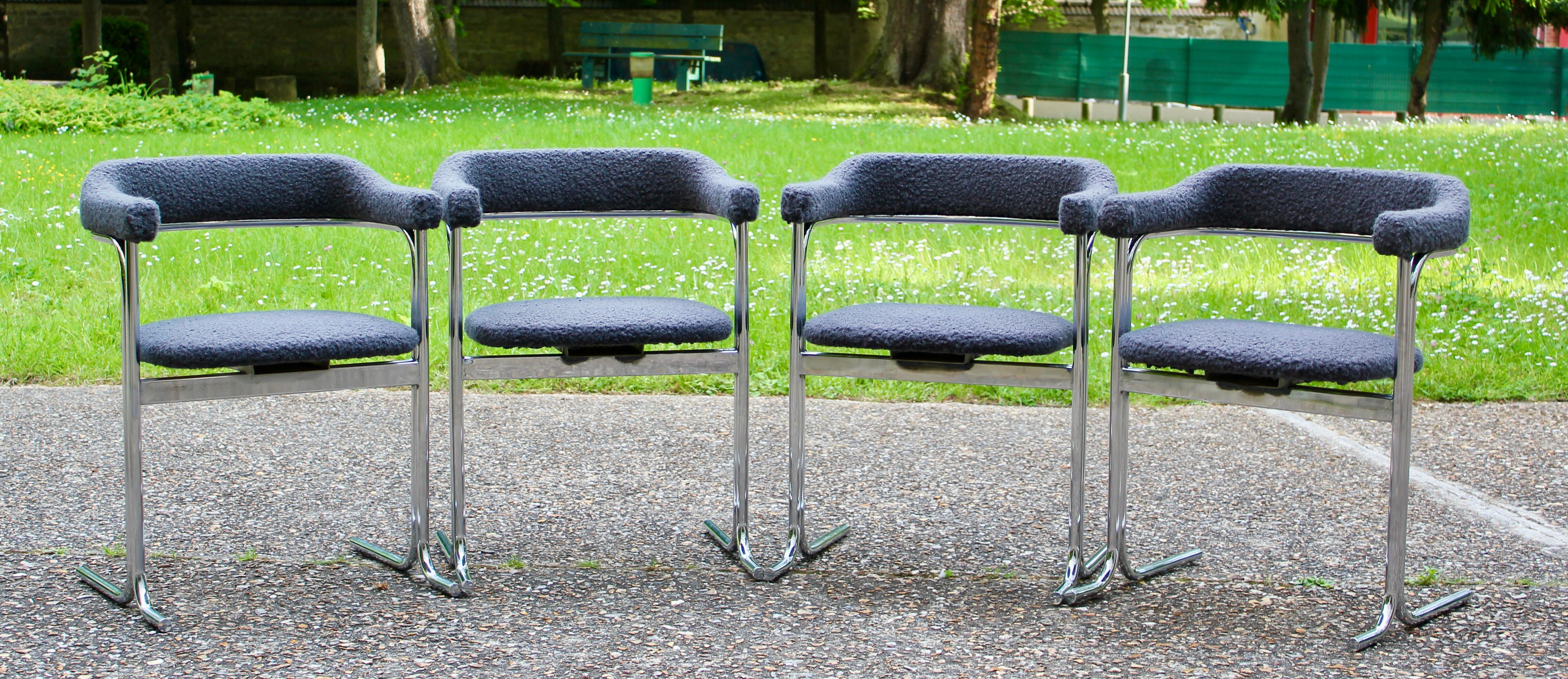 Set of 4 Space age chairs, chrome steel and buckle fabric