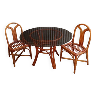 Rattan and smoked glass table + 2 chairs