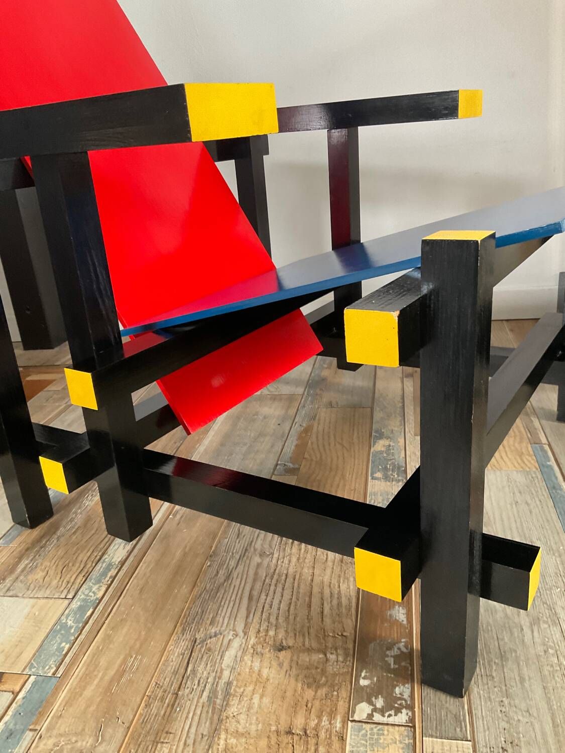 “Red and blue” lounge chair in the style of Gerrit Rietveld