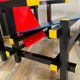 “Red and blue” lounge chair in the style of Gerrit Rietveld