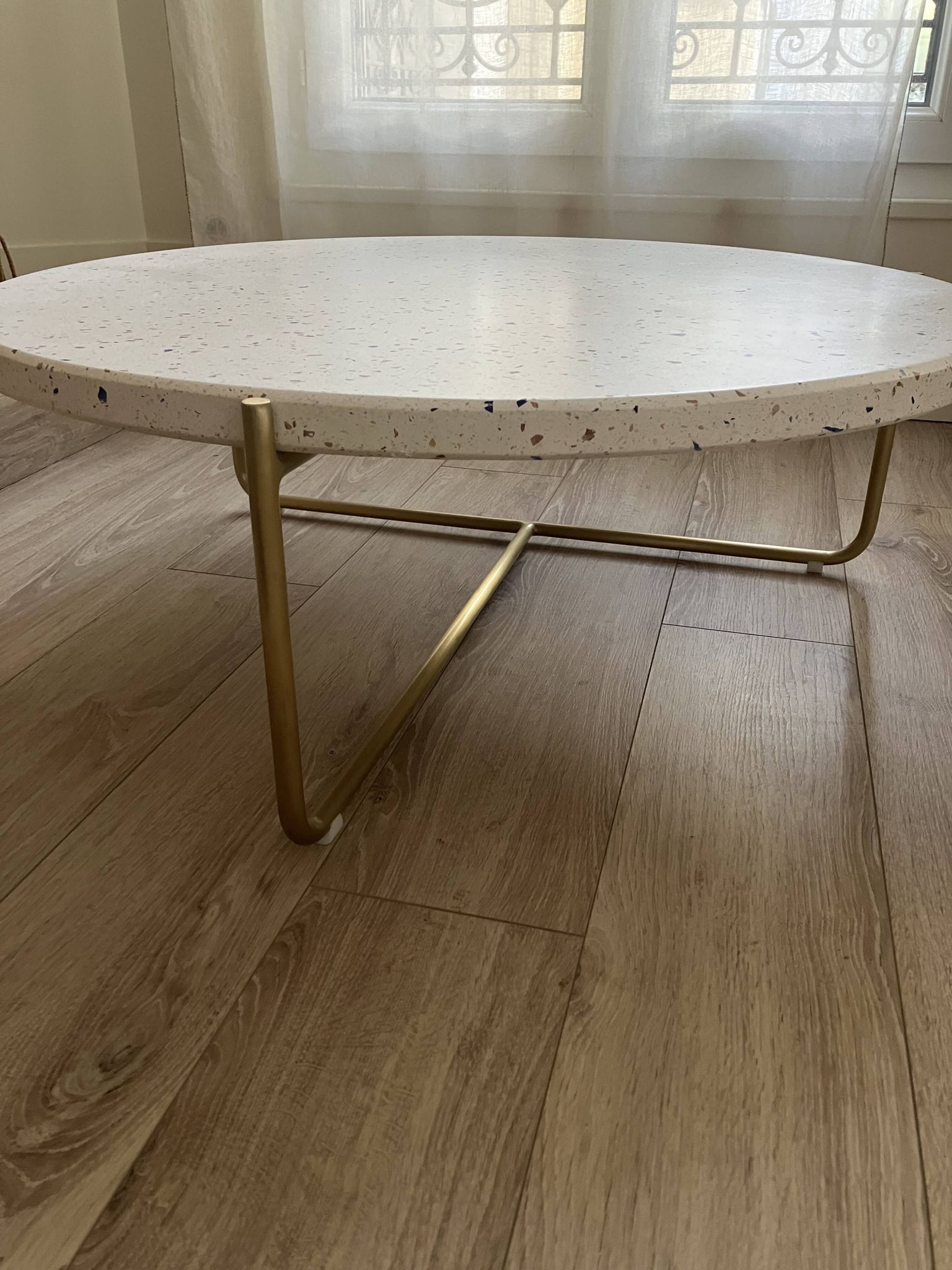 Anatole Coffee table in terrazzo and confetti metal by the brand Tikamoon.