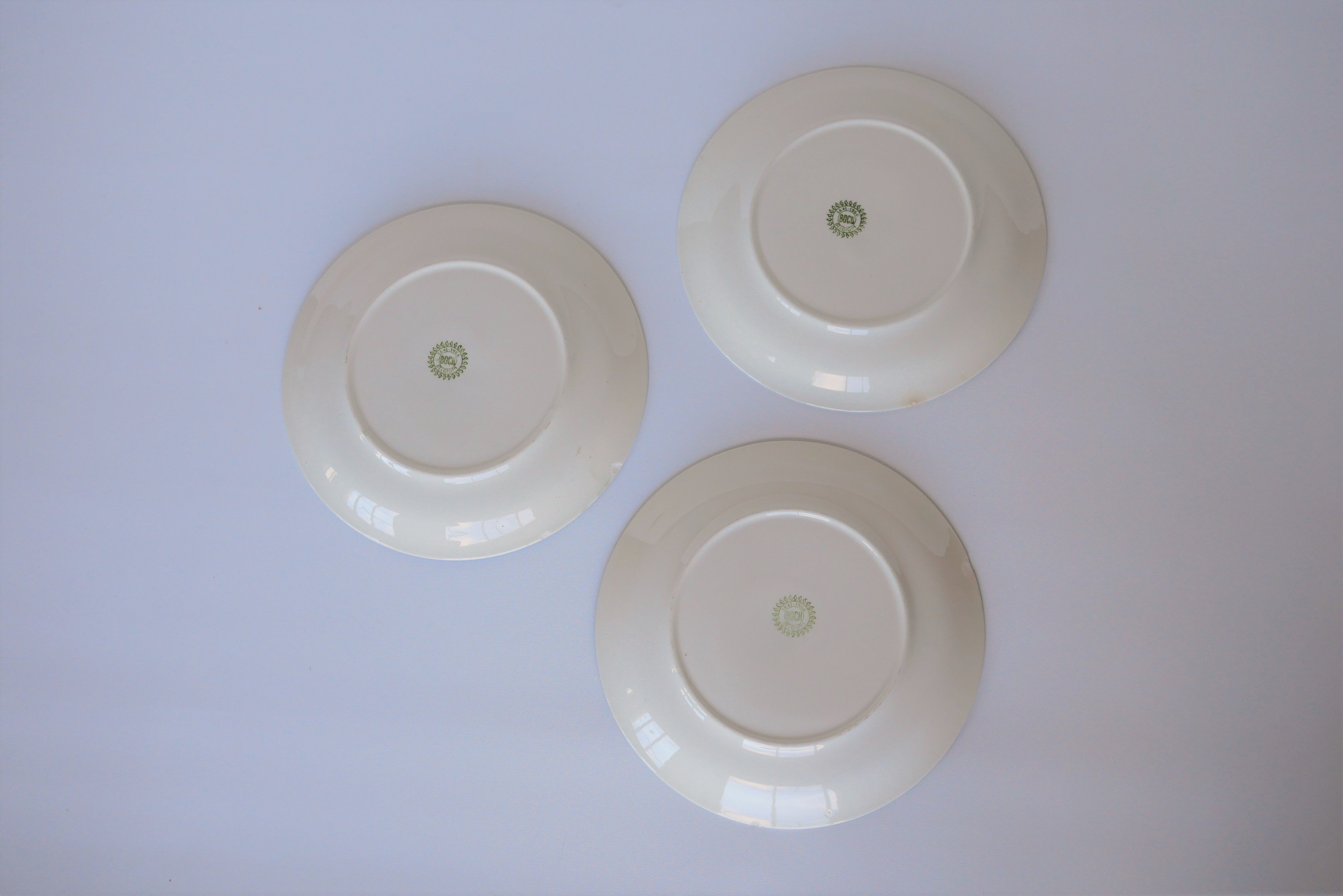 Series of 8 vintage plates edited by Boch La Louvière