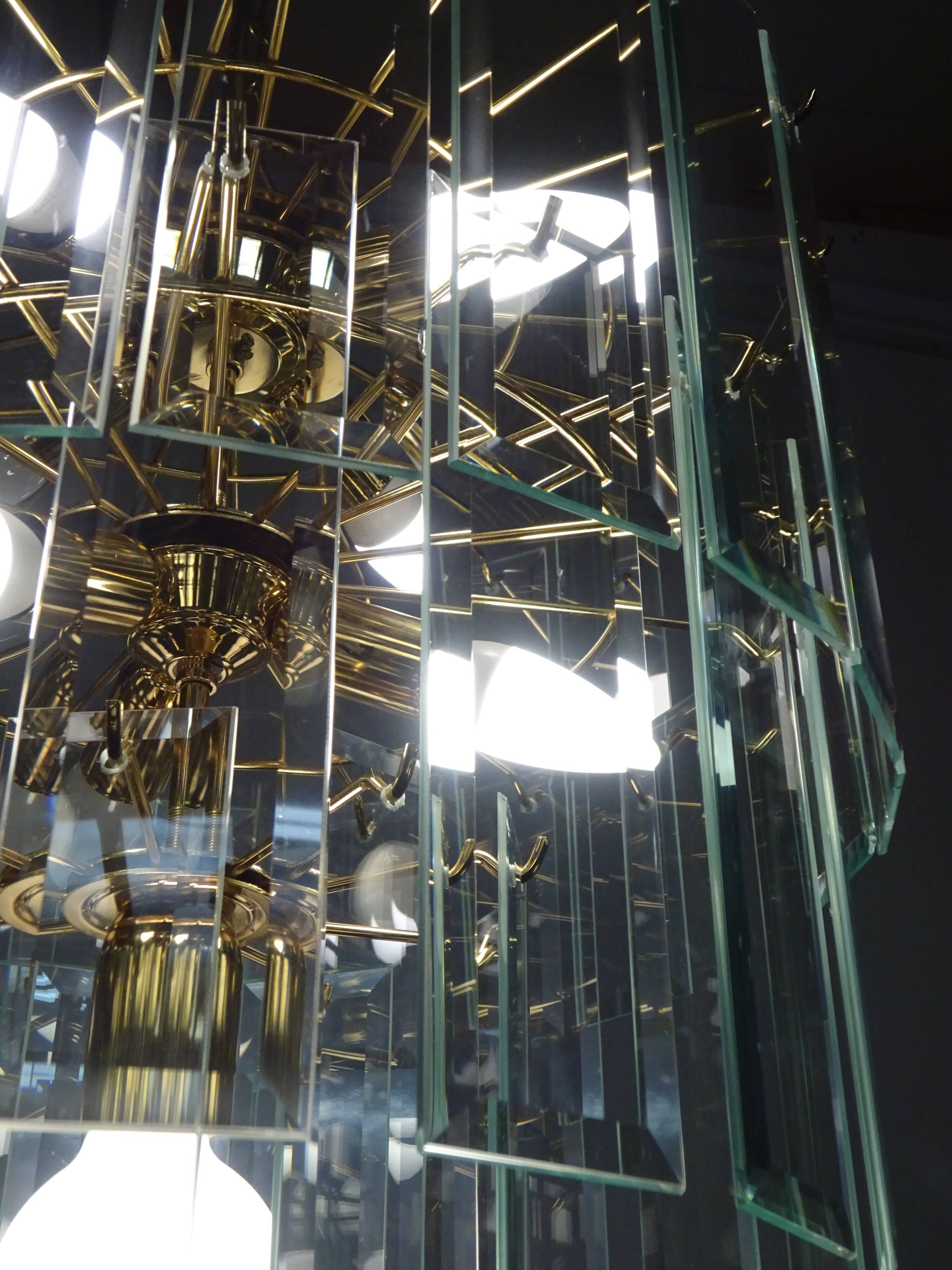 Brass chandelier and beveled glass, Italian manufacturing