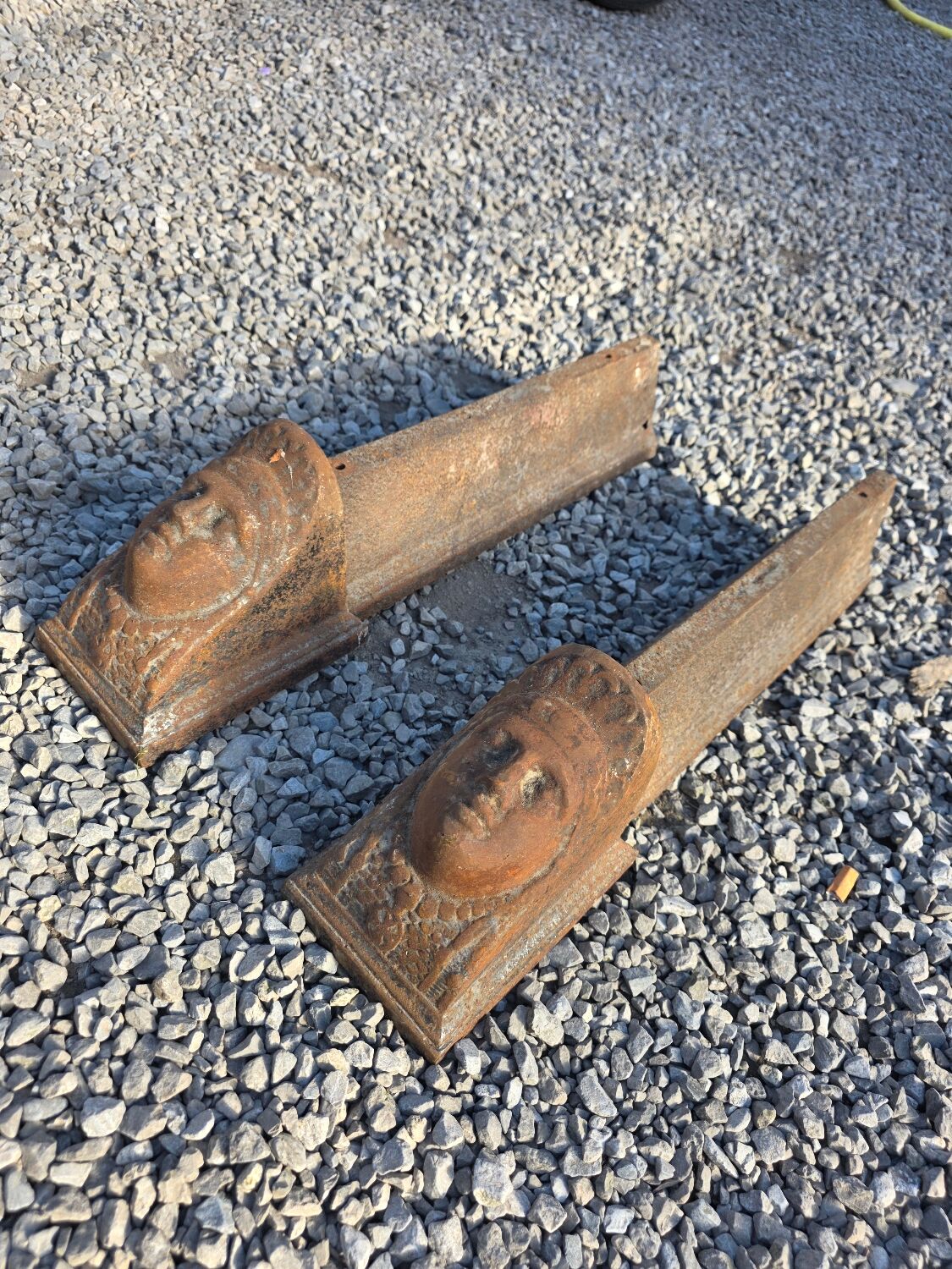 Pair of cast iron andirons from the 19th century.