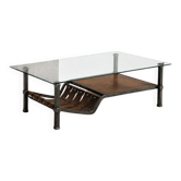 Brutalist coffee table in wrought iron and leather.