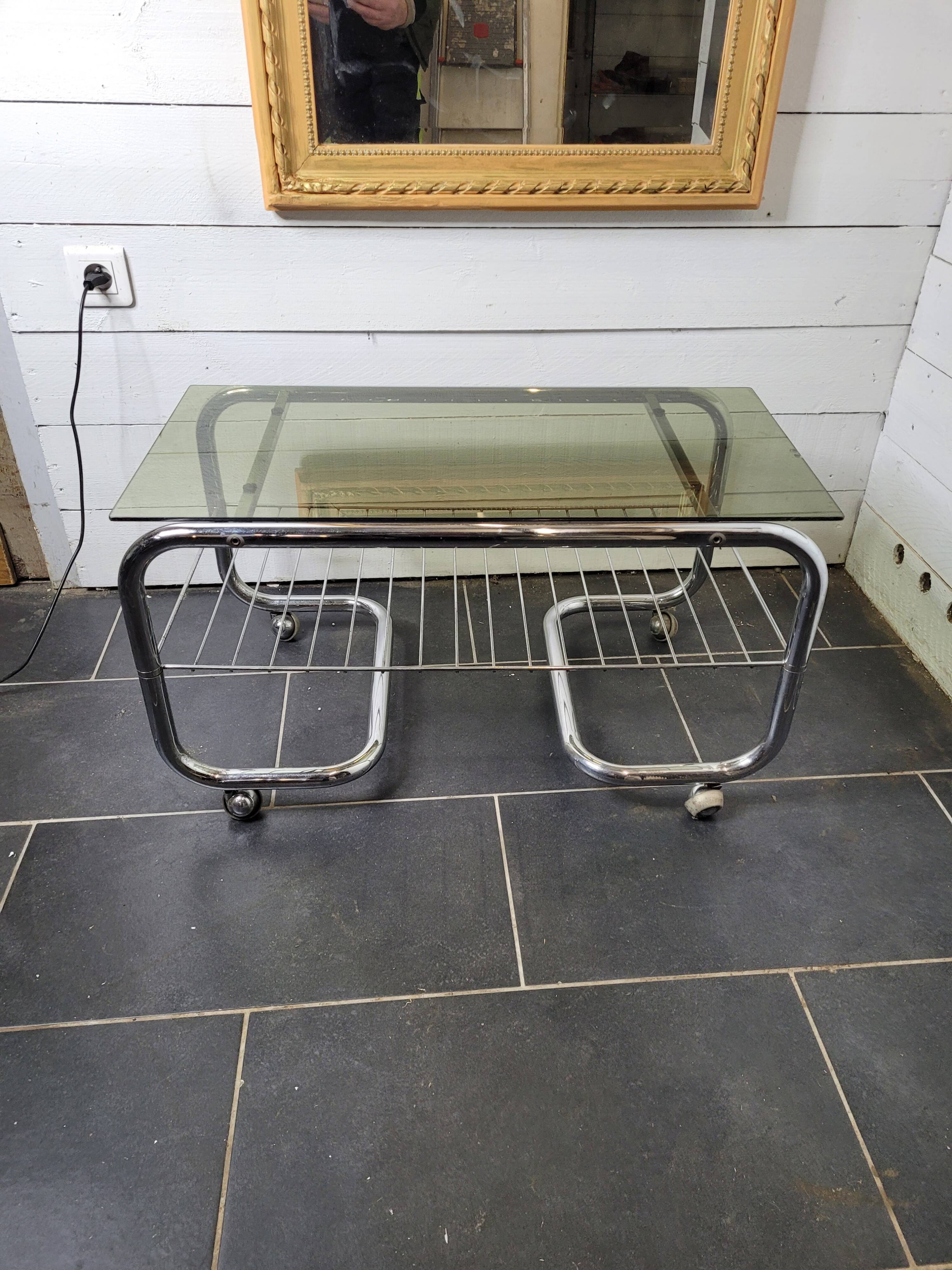 Coffee table with chrome base and smoked glass from the 70s