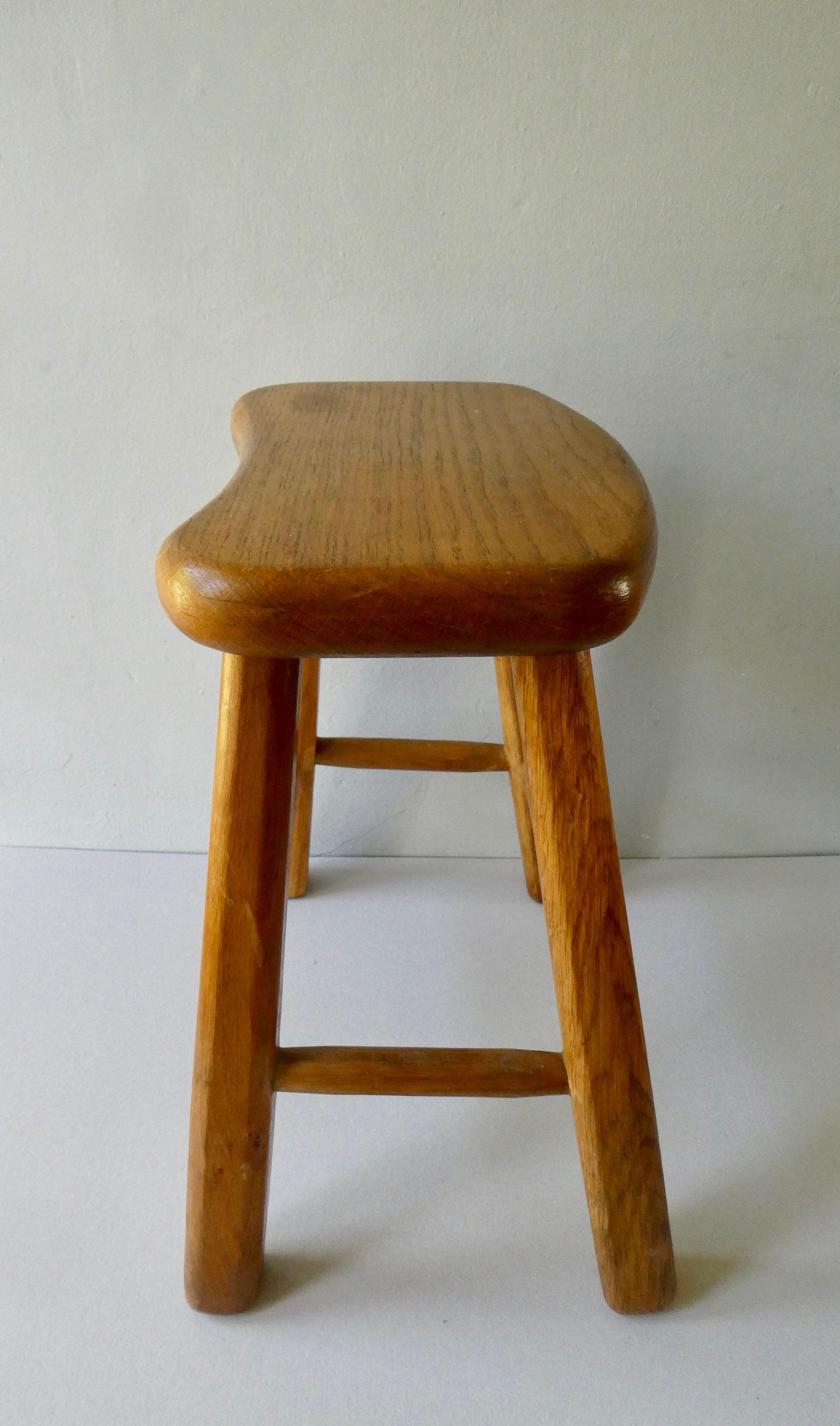 Light wood stool, free-form seat