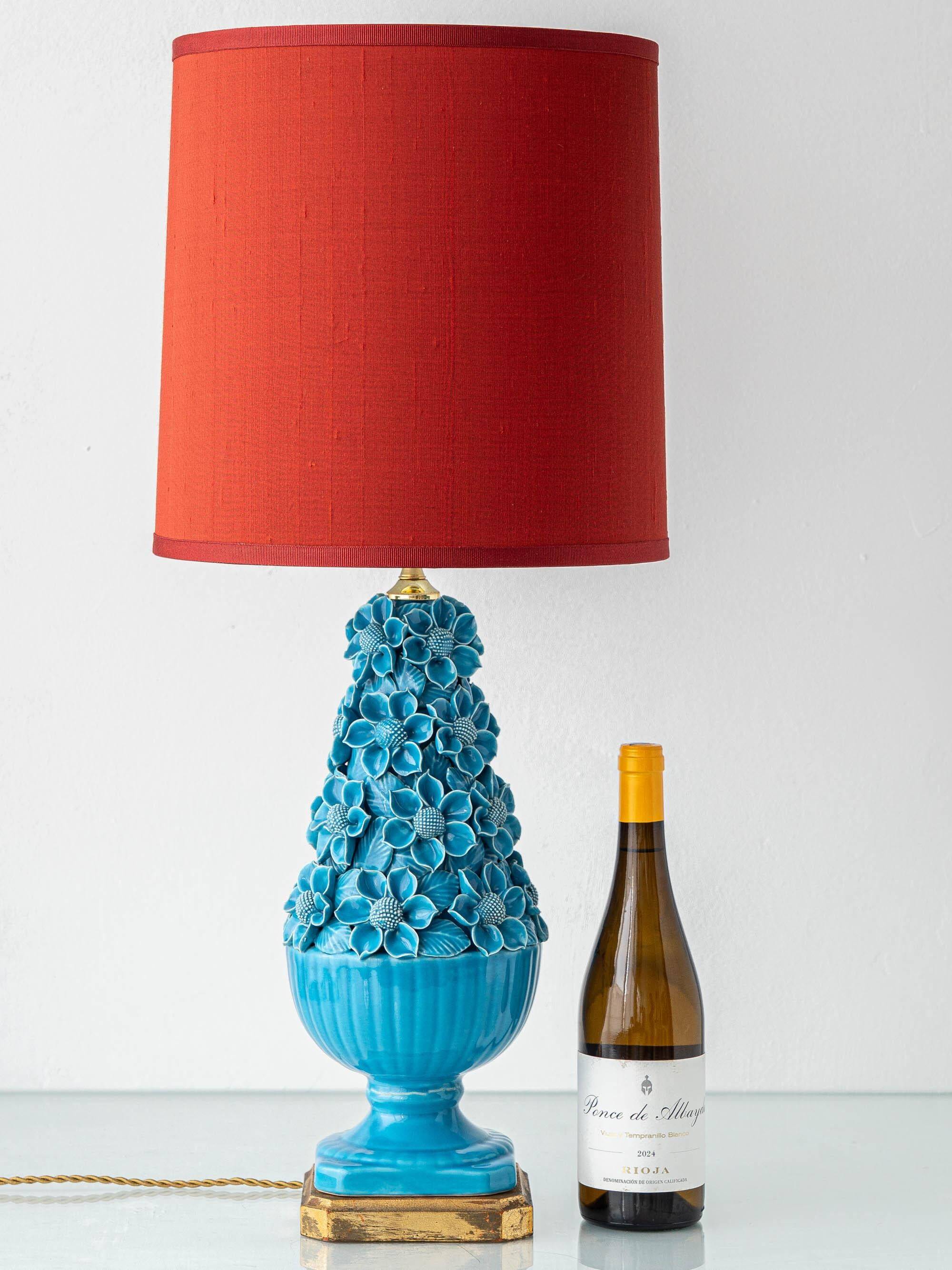 Turquoise glazed ceramic floral table lamp from Manises mid-century, with a new silk shade.